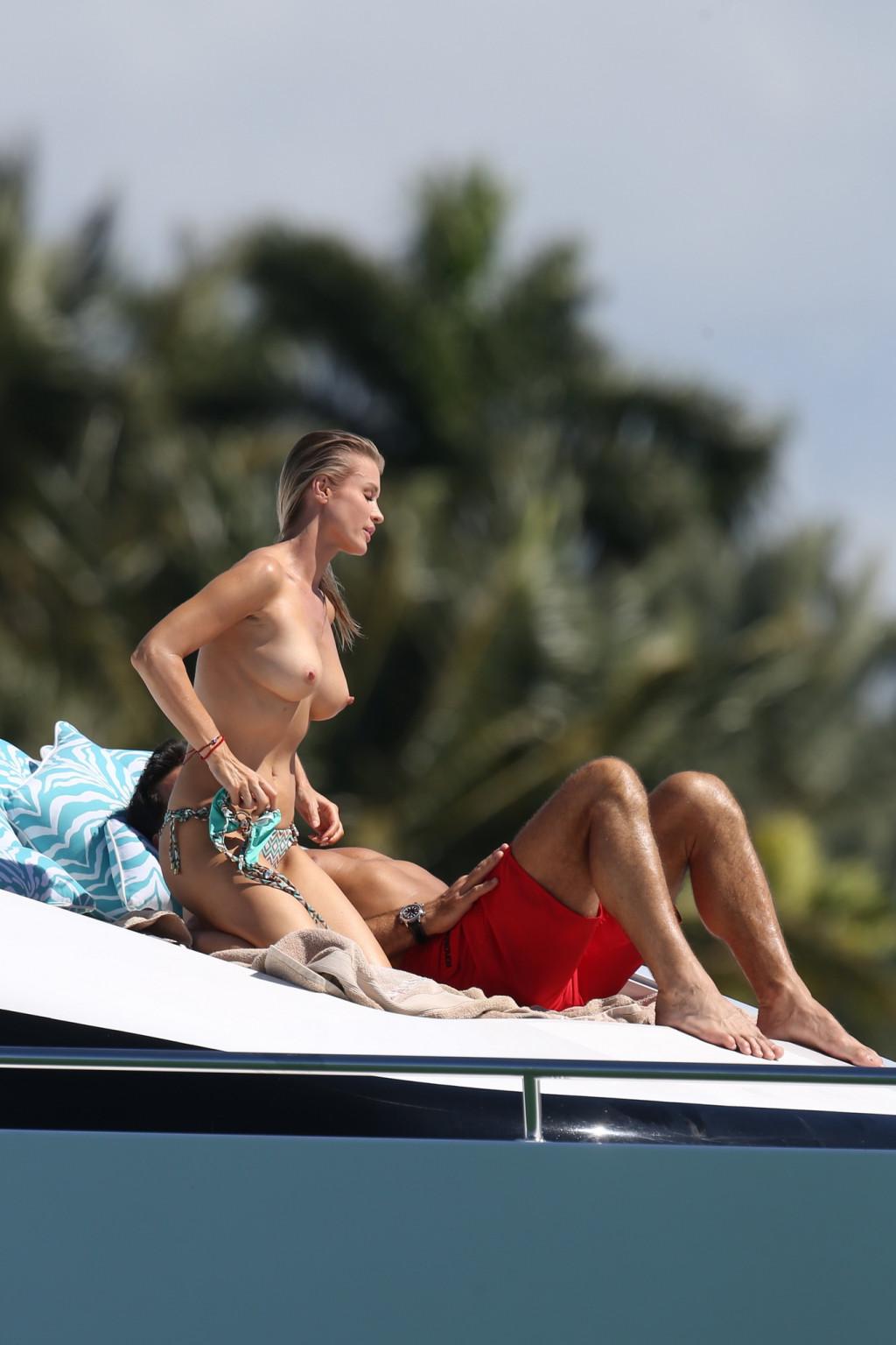 16P Joanna Krupa tanning topless at the yacht in Miami