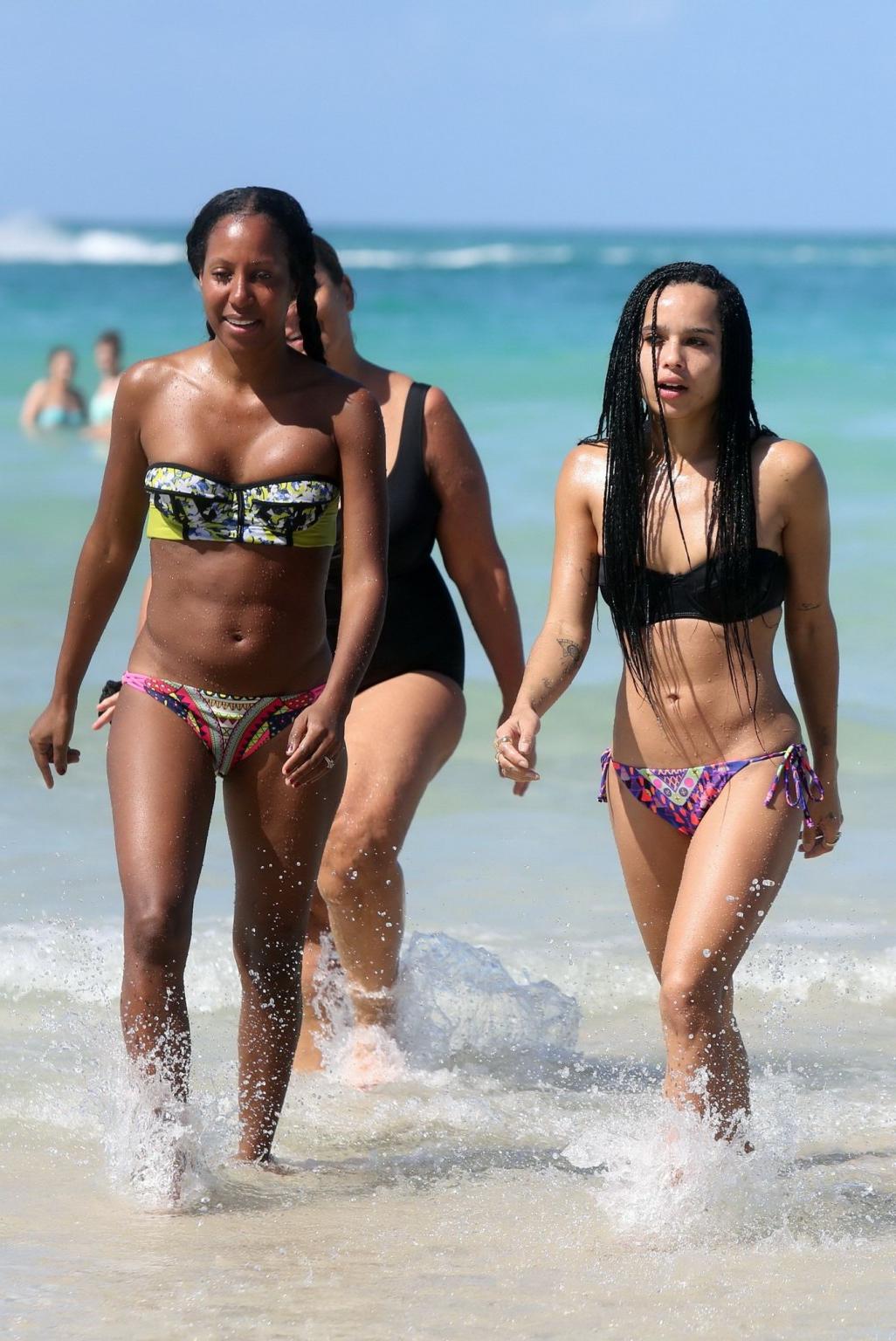16P Zoe Kravitz showing her juicy ass in tiny tube bikini at a beach in Miami