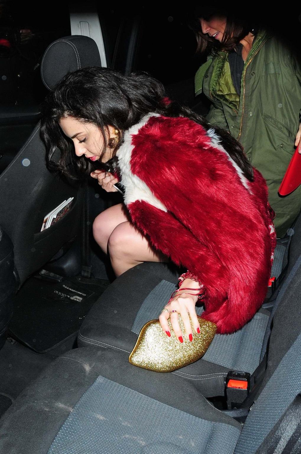 16P Charli XCX busty and braless leaving The Warner Music BRIT Party in London