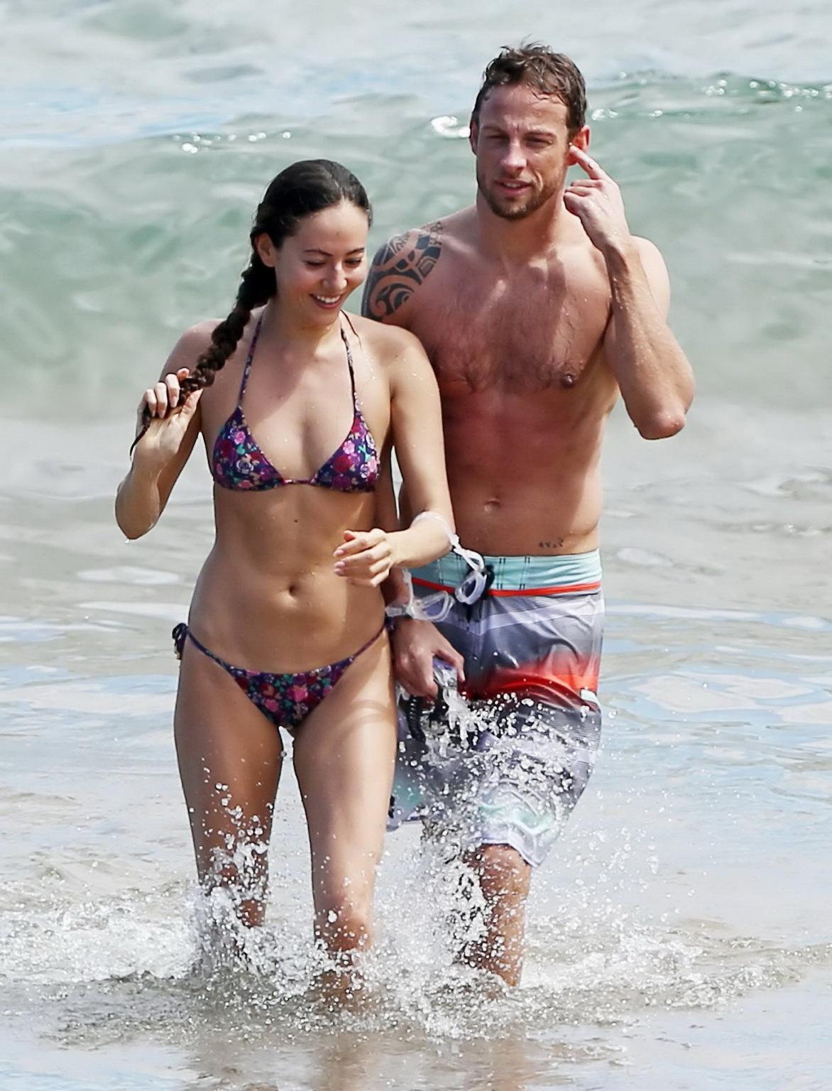 15P Jessica Michibata shows off her juicy ass in a tiny floral bikini at the beach i
