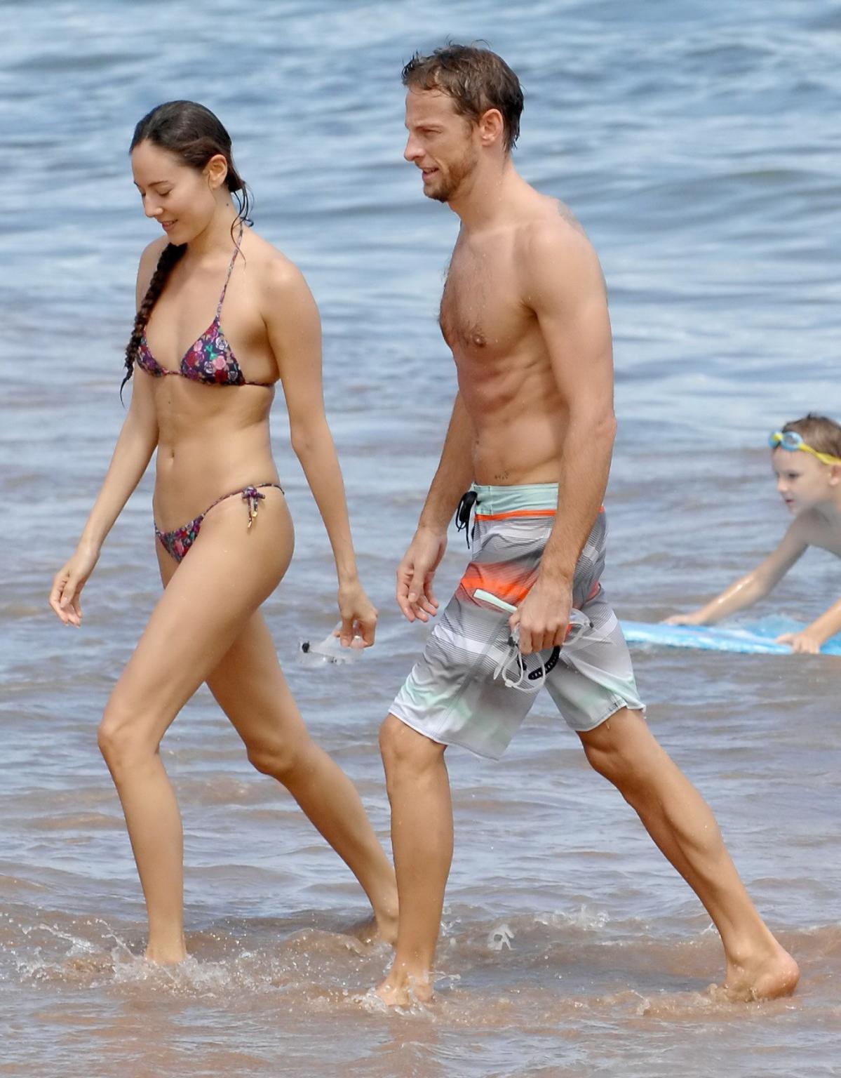 15P Jessica Michibata shows off her juicy ass in a tiny floral bikini at the beach i