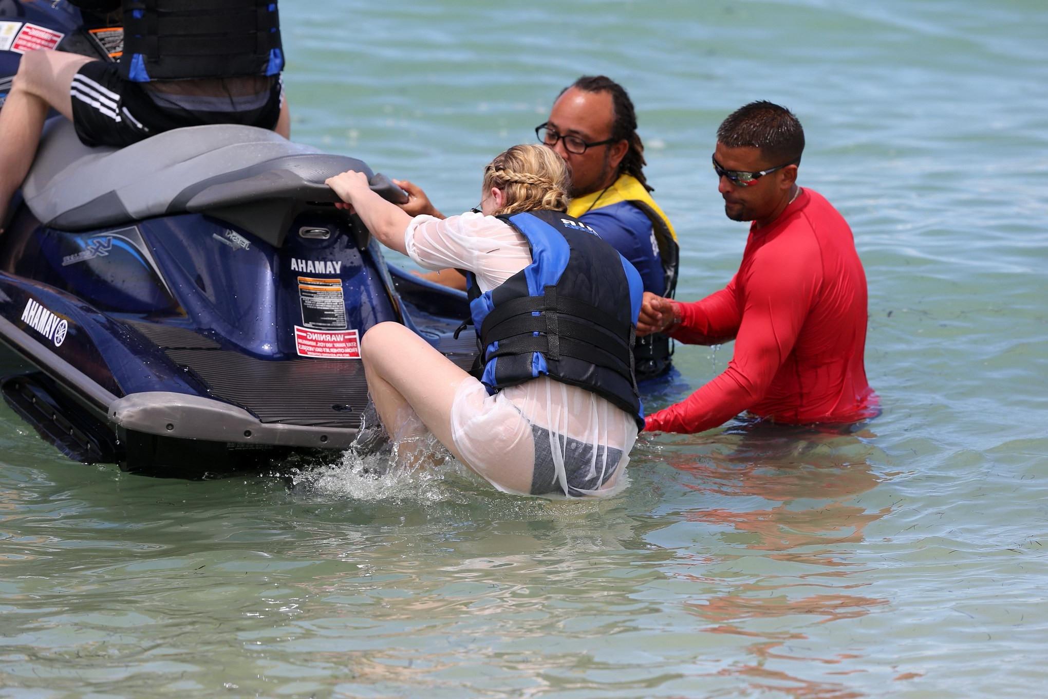 16P Chloe Moretz shows off her juicy ass in a skimpy black bikini at the beach in Mi