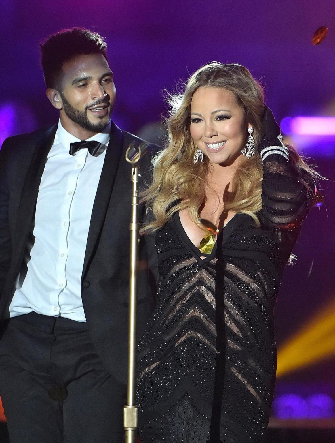 16P Mariah Carey cleavy wearing two skimpy dresses at the World Music Awards in Mont