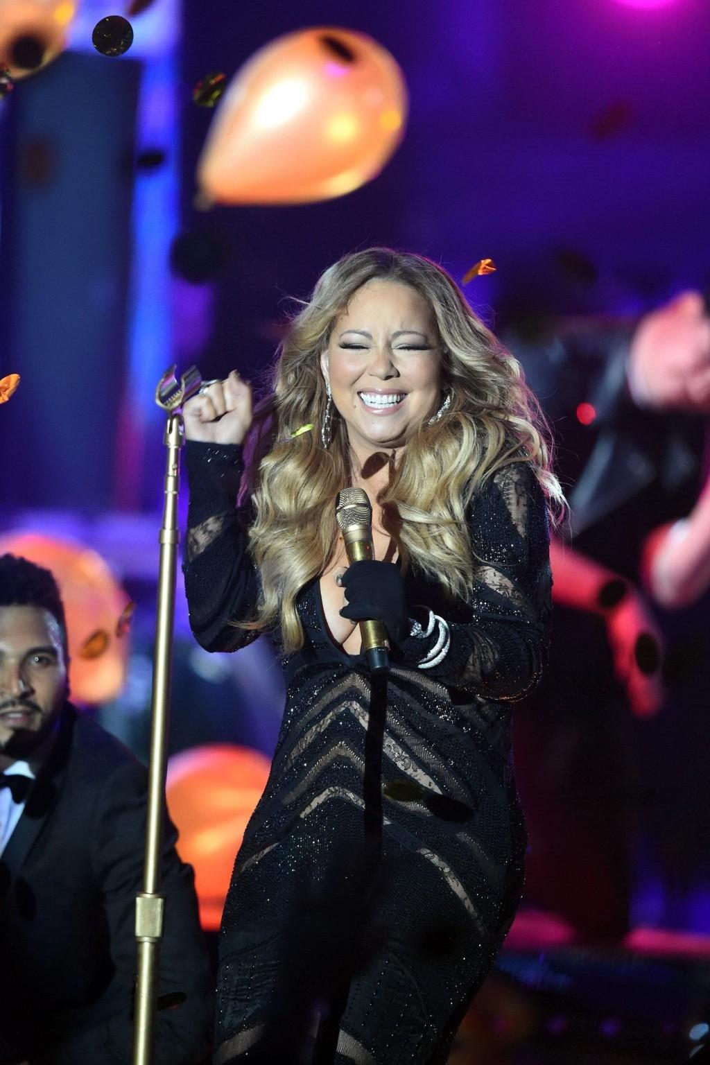 16P Mariah Carey cleavy wearing two skimpy dresses at the World Music Awards in Mont