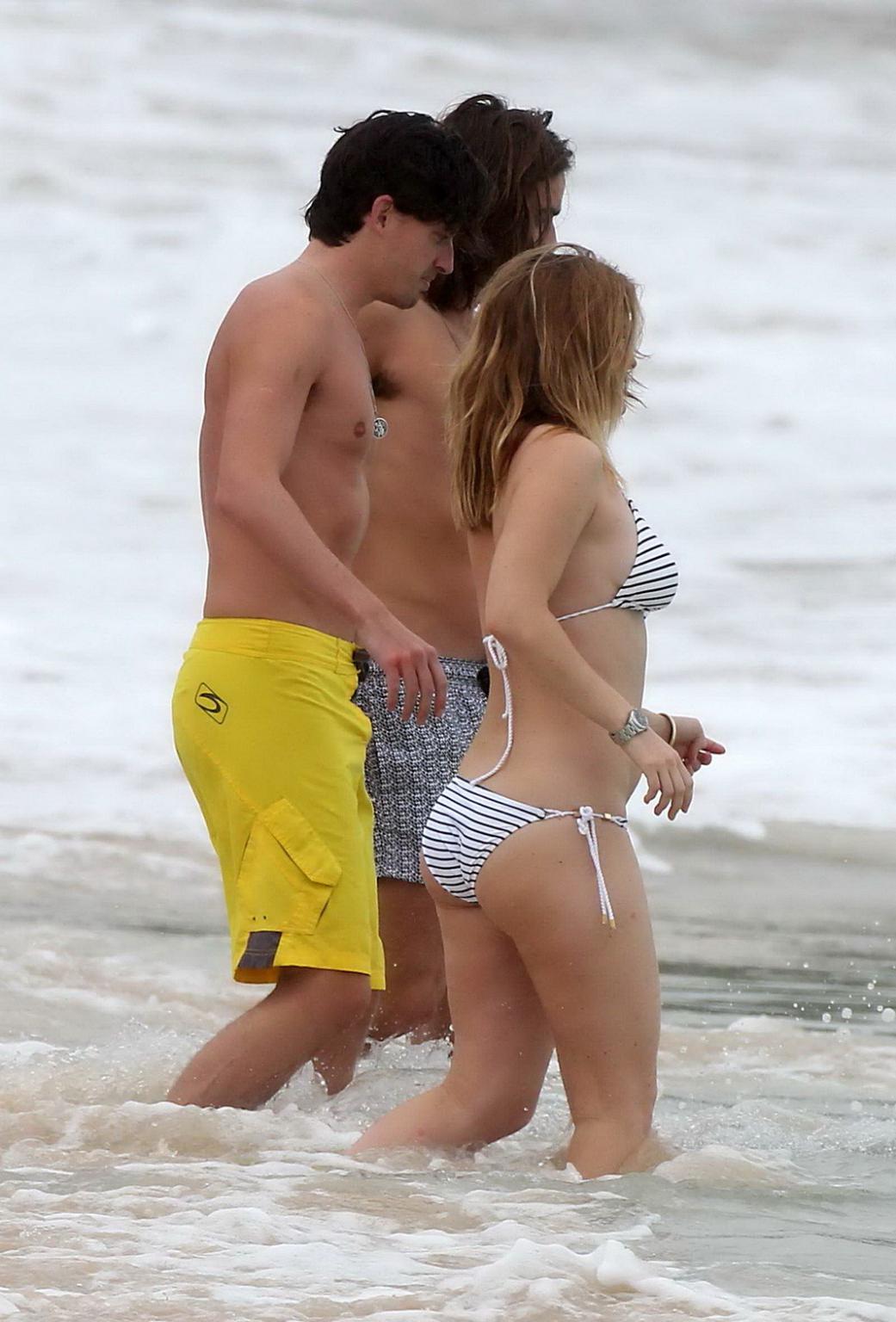 16P Alice Eve slipping out of her skimpy striped bikini on a beach in Barbados