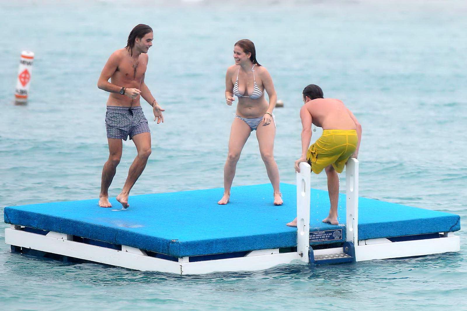 16P Alice Eve slipping out of her skimpy striped bikini on a beach in Barbados