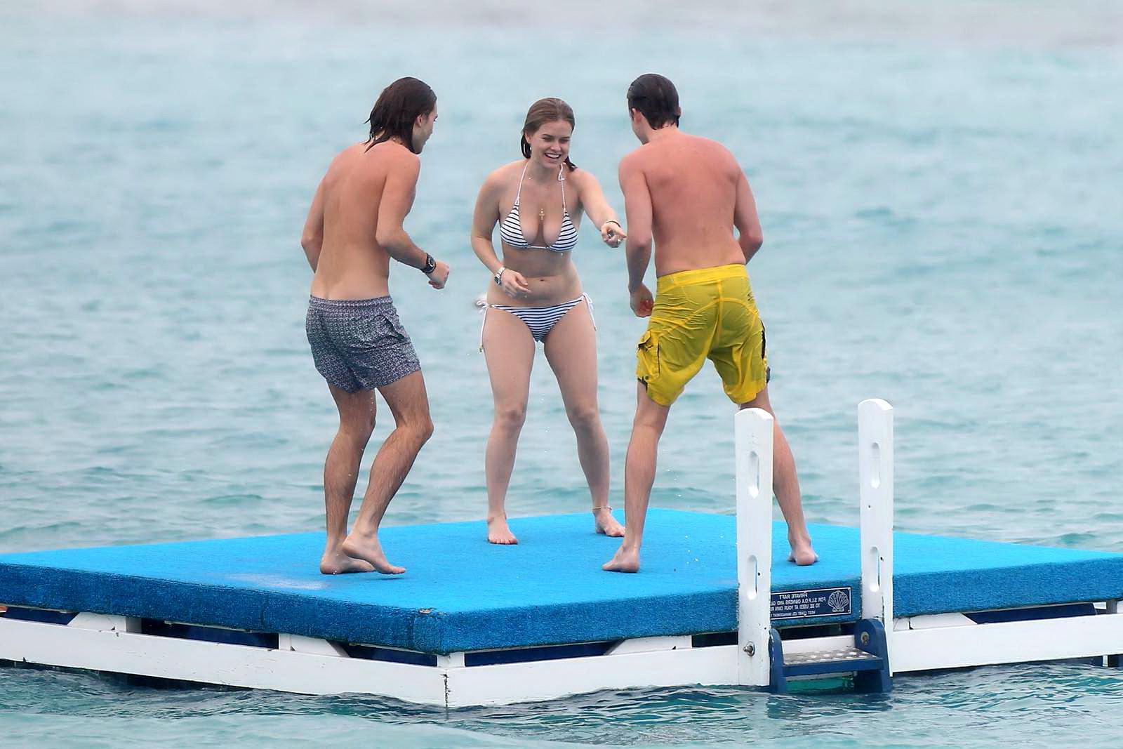 16P Alice Eve slipping out of her skimpy striped bikini on a beach in Barbados