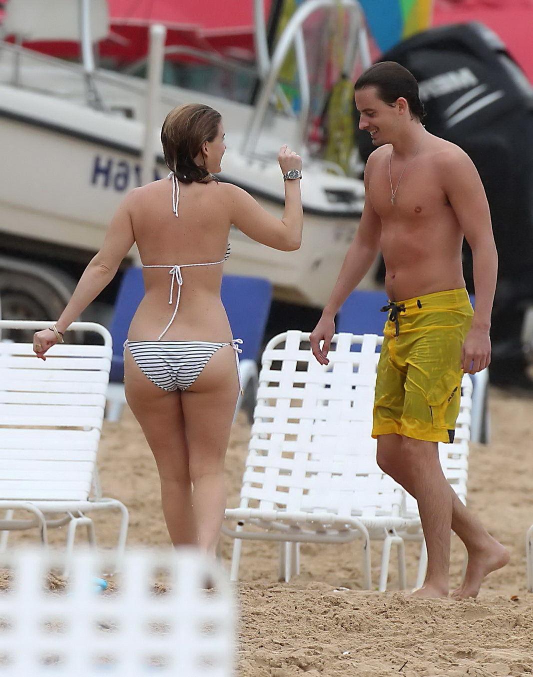 16P Alice Eve slipping out of her skimpy striped bikini on a beach in Barbados