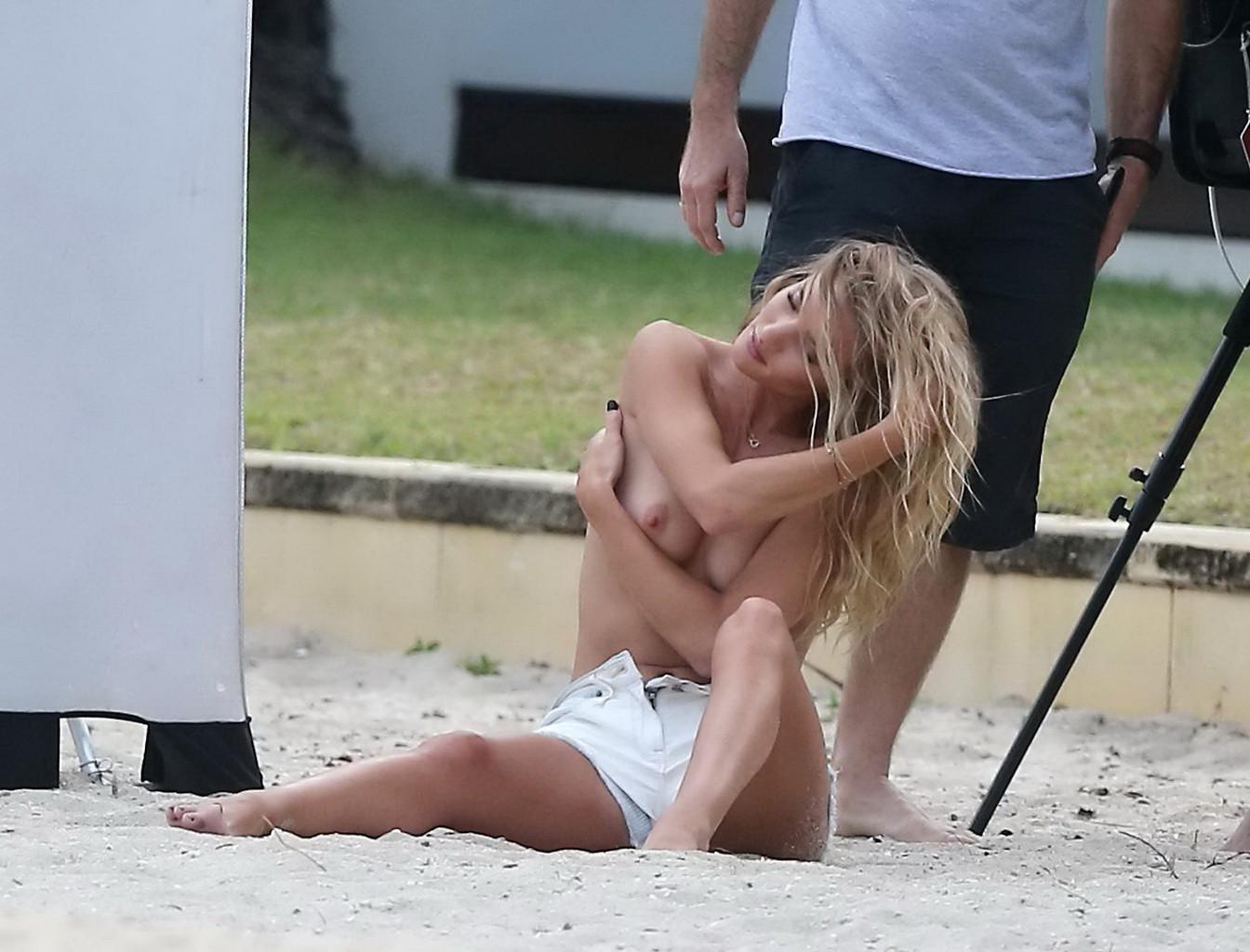 16P Rosie Huntington-Whiteley topless in a white denim shorts doing a beach photosho