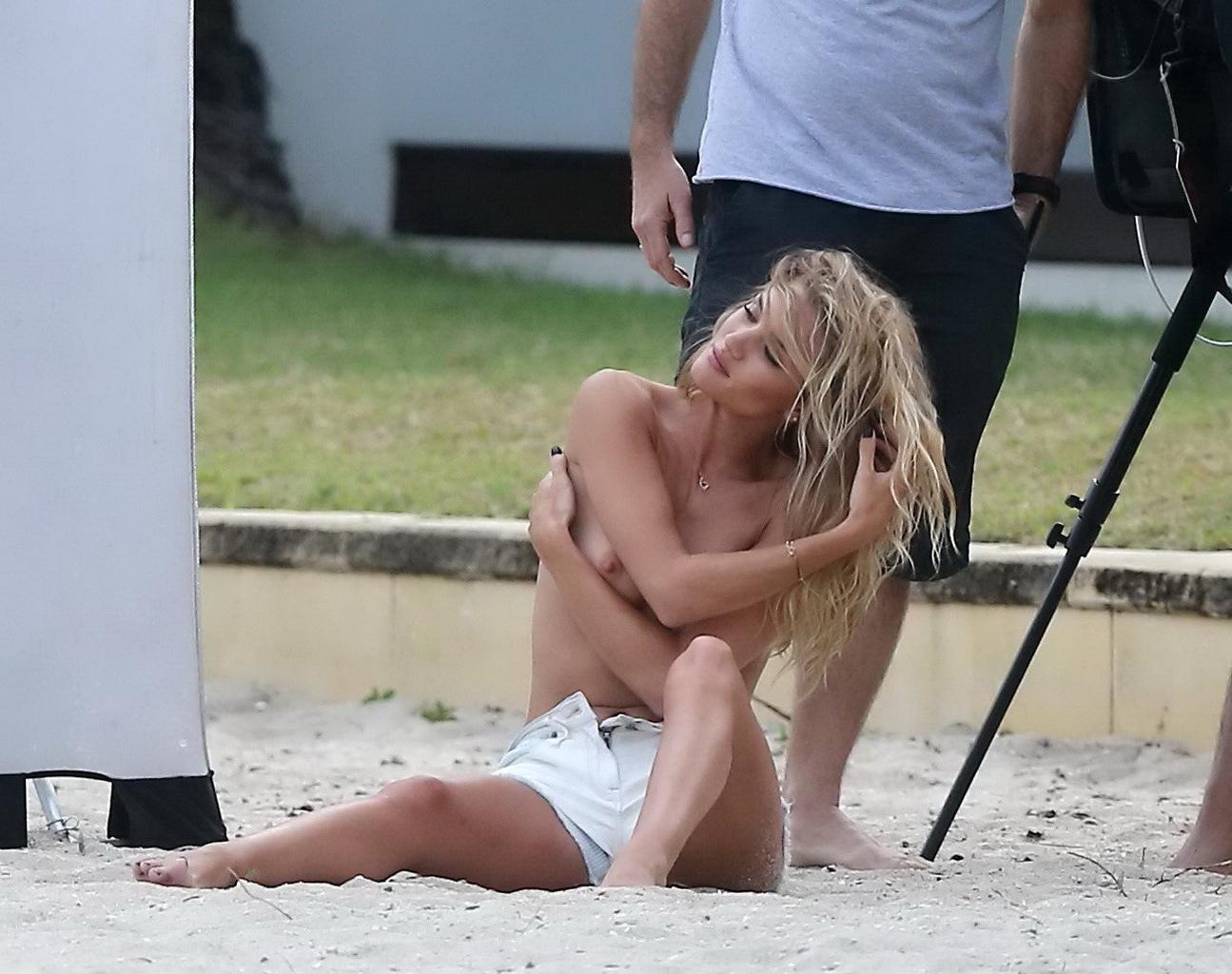 16P Rosie Huntington-Whiteley topless in a white denim shorts doing a beach photosho
