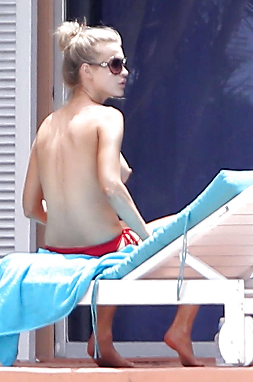 16P Joanna Krupa showing hot body in topless bikini out poolside 