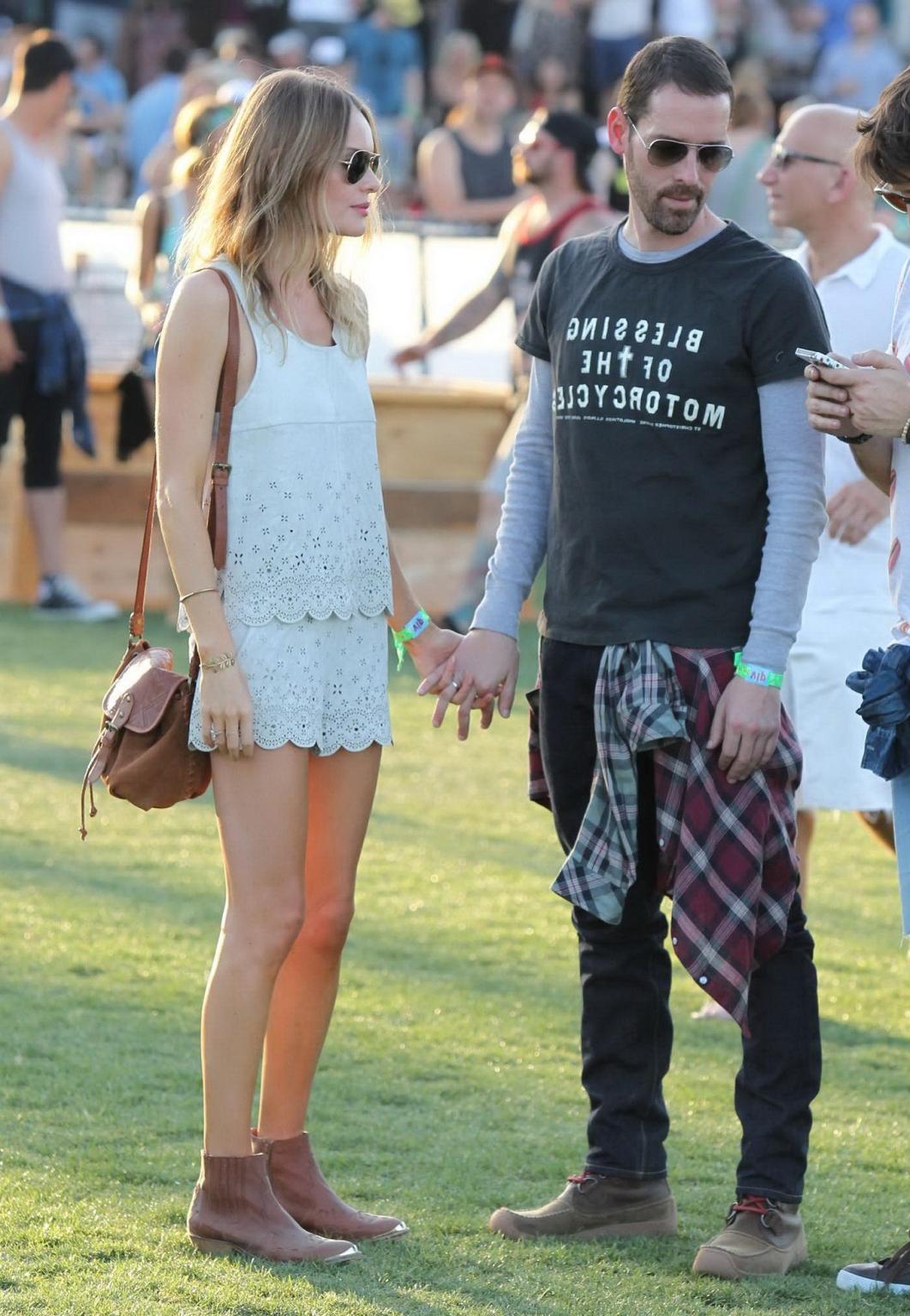 16P Kate Bosworth leggy wearing retro shorts and top at Coachella Music and Arts Fes