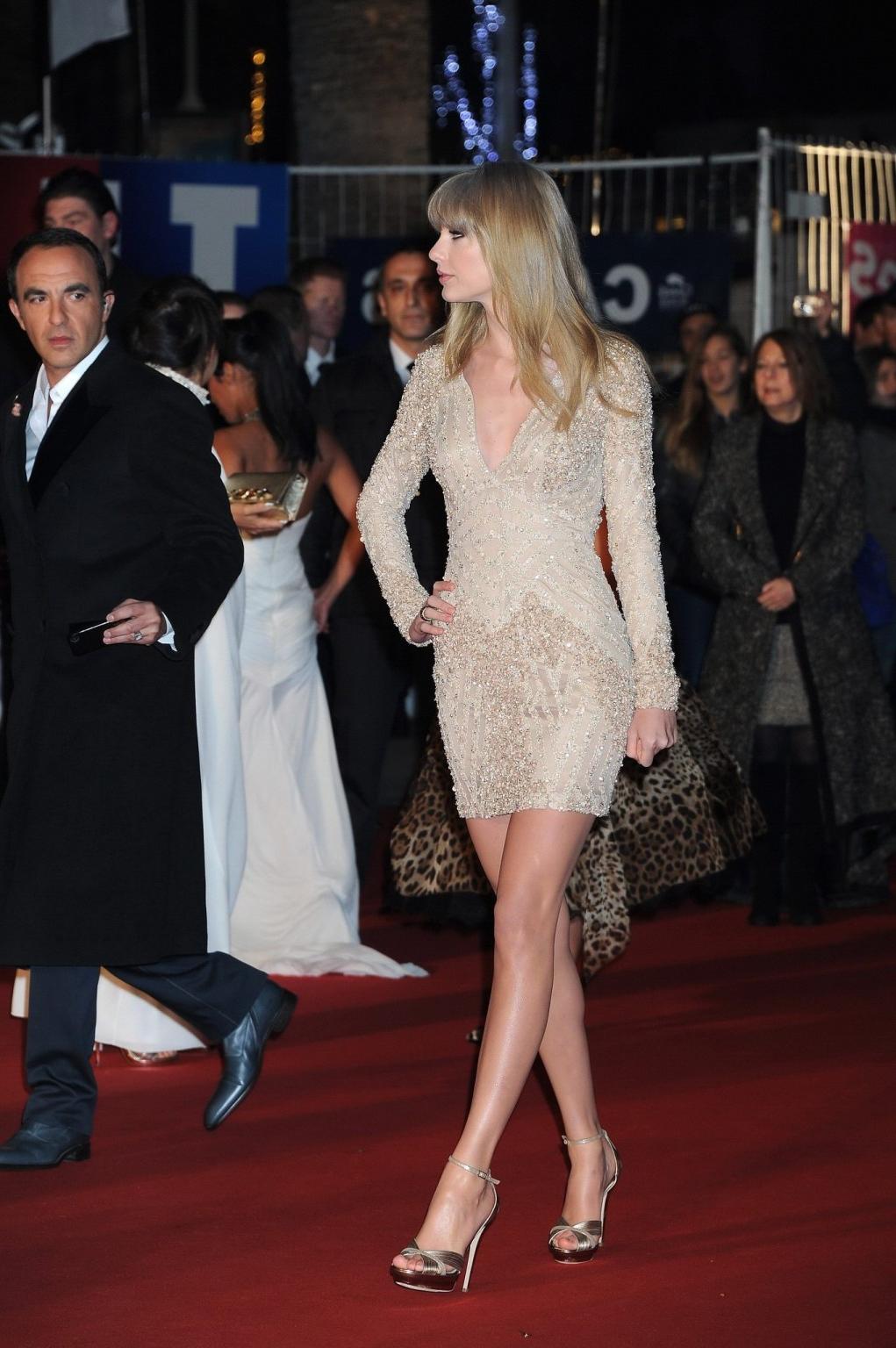 10P Taylor Swift cleavy and leggy wearing tight mini dress at NRJ Music Awards 2013 