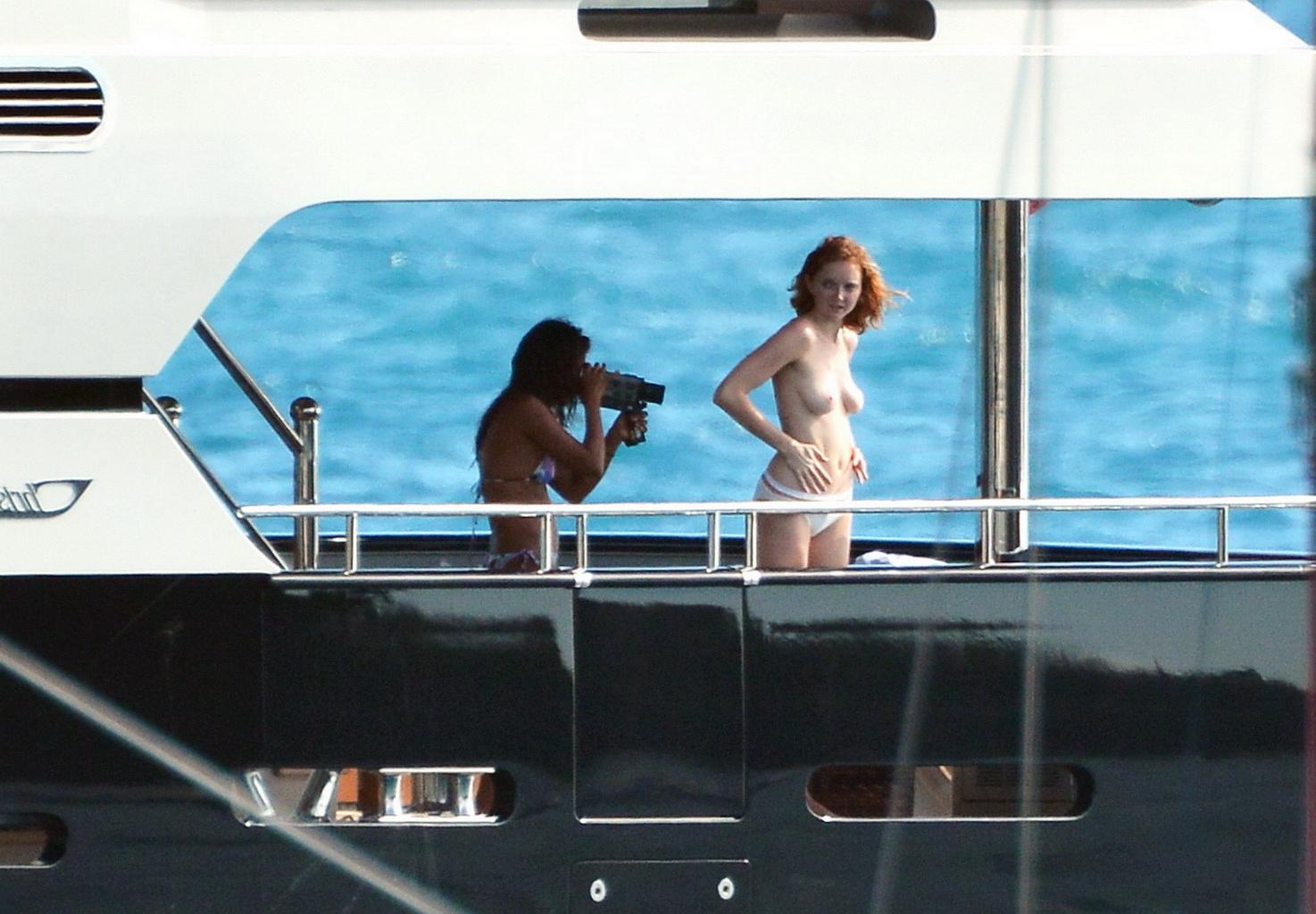 10P Busty Lily Cole diving topless from a yacht in St. Barts