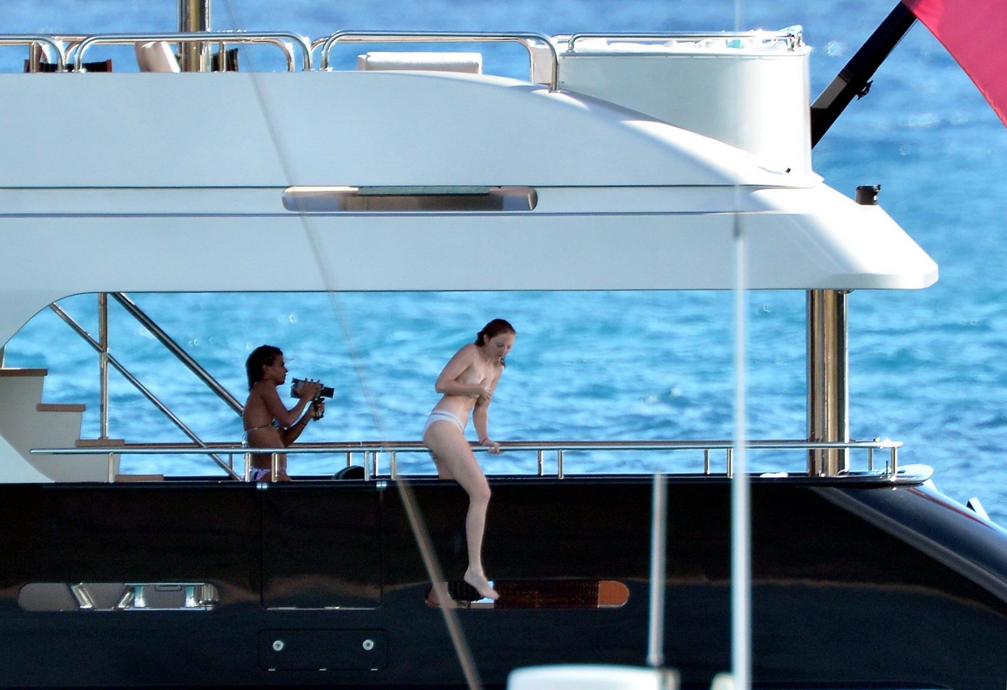 10P Busty Lily Cole diving topless from a yacht in St. Barts