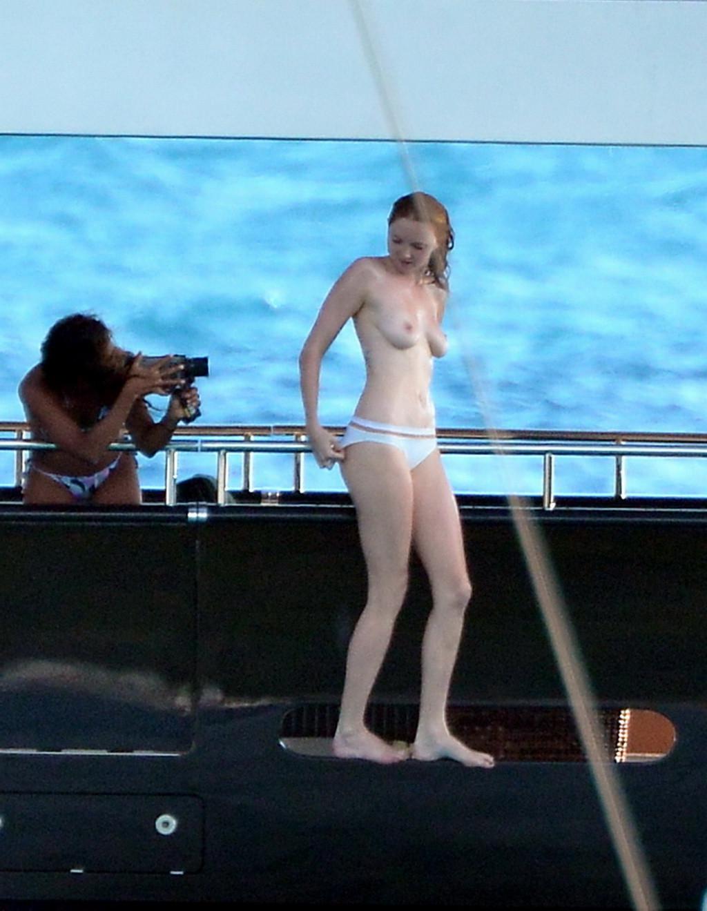 10P Busty Lily Cole diving topless from a yacht in St. Barts