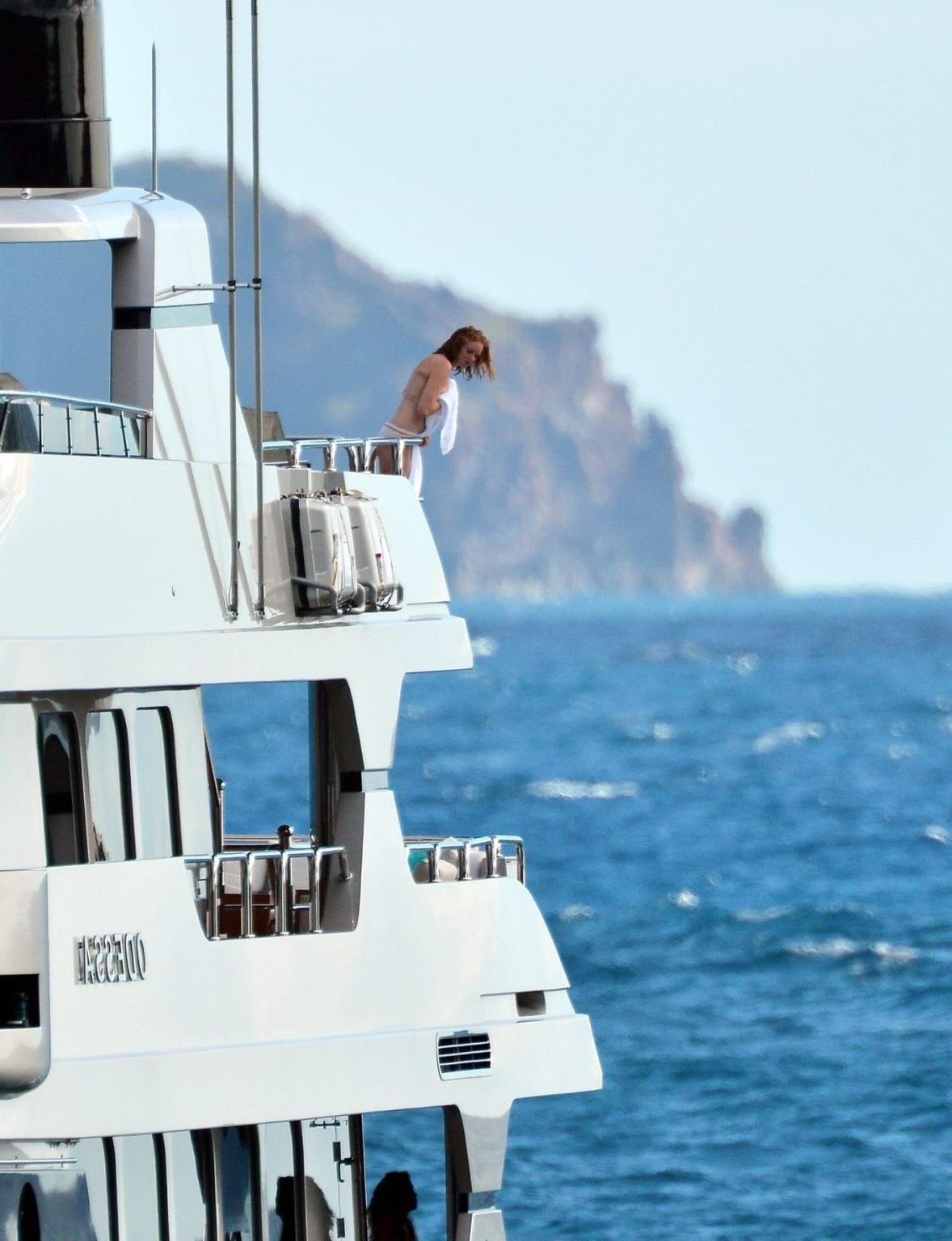 10P Busty Lily Cole diving topless from a yacht in St. Barts
