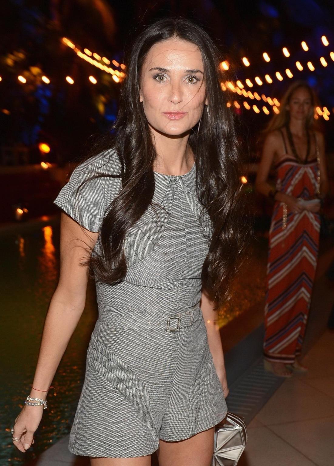 10P Demi Moore leggy at Chanel Beachside BBQ celebrating Art.sy in Miami Beach