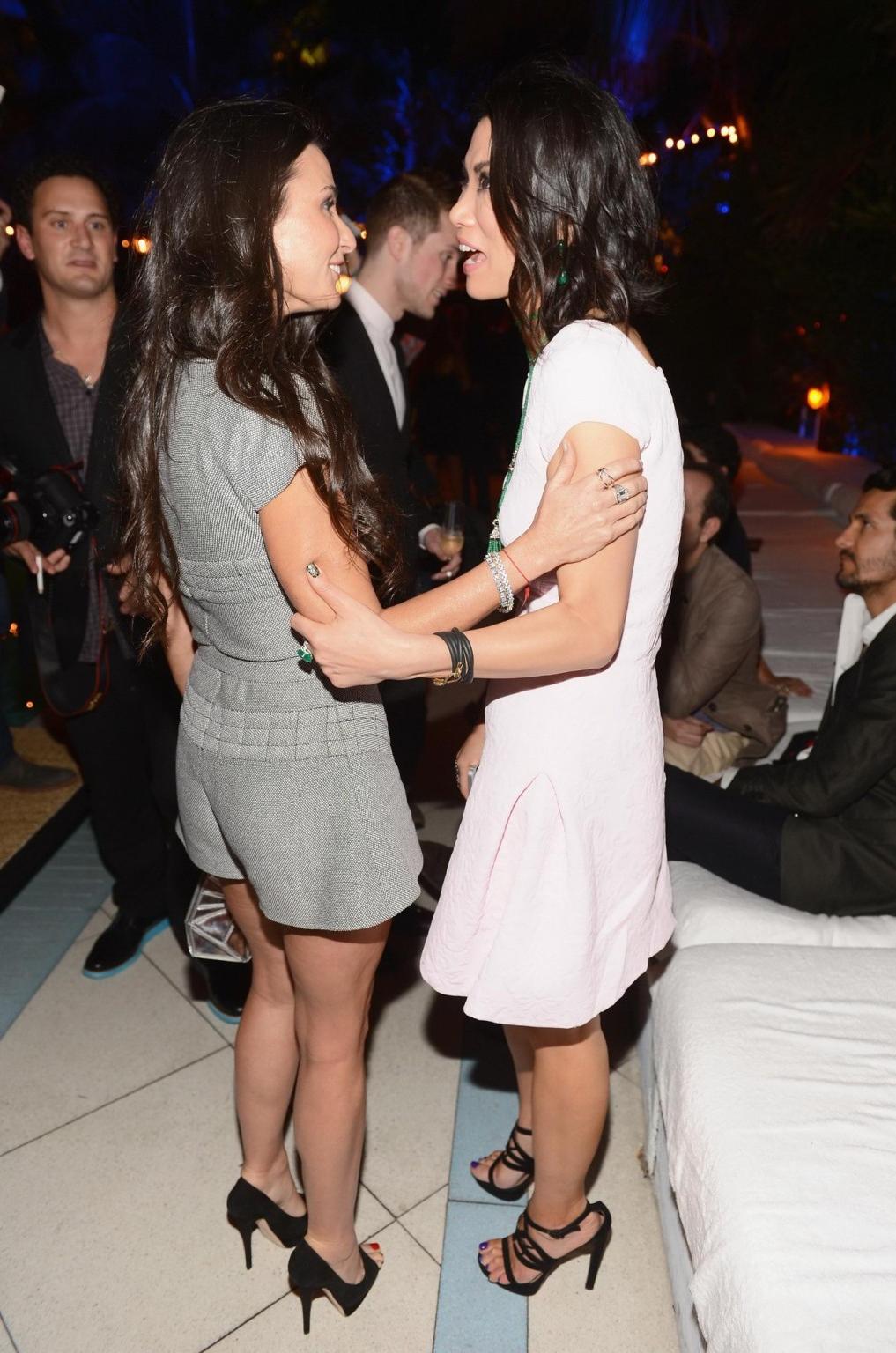 10P Demi Moore leggy at Chanel Beachside BBQ celebrating Art.sy in Miami Beach
