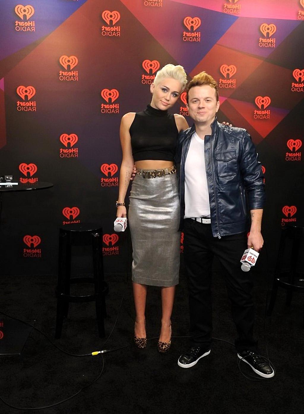 10P Miley Cyrus showing off her boobs in see through top at IHeartRadio music festiv