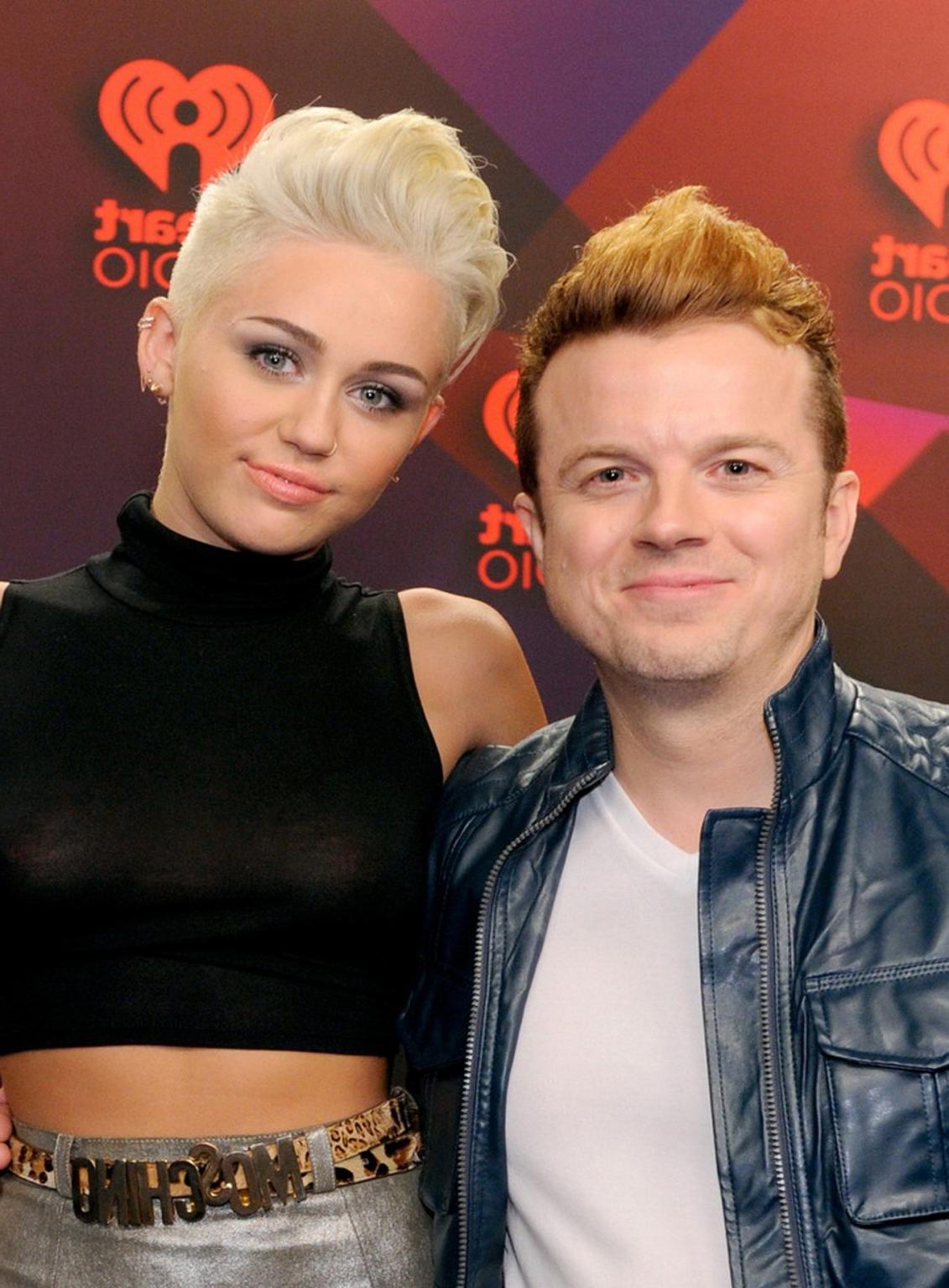 10P Miley Cyrus showing off her boobs in see through top at IHeartRadio music festiv