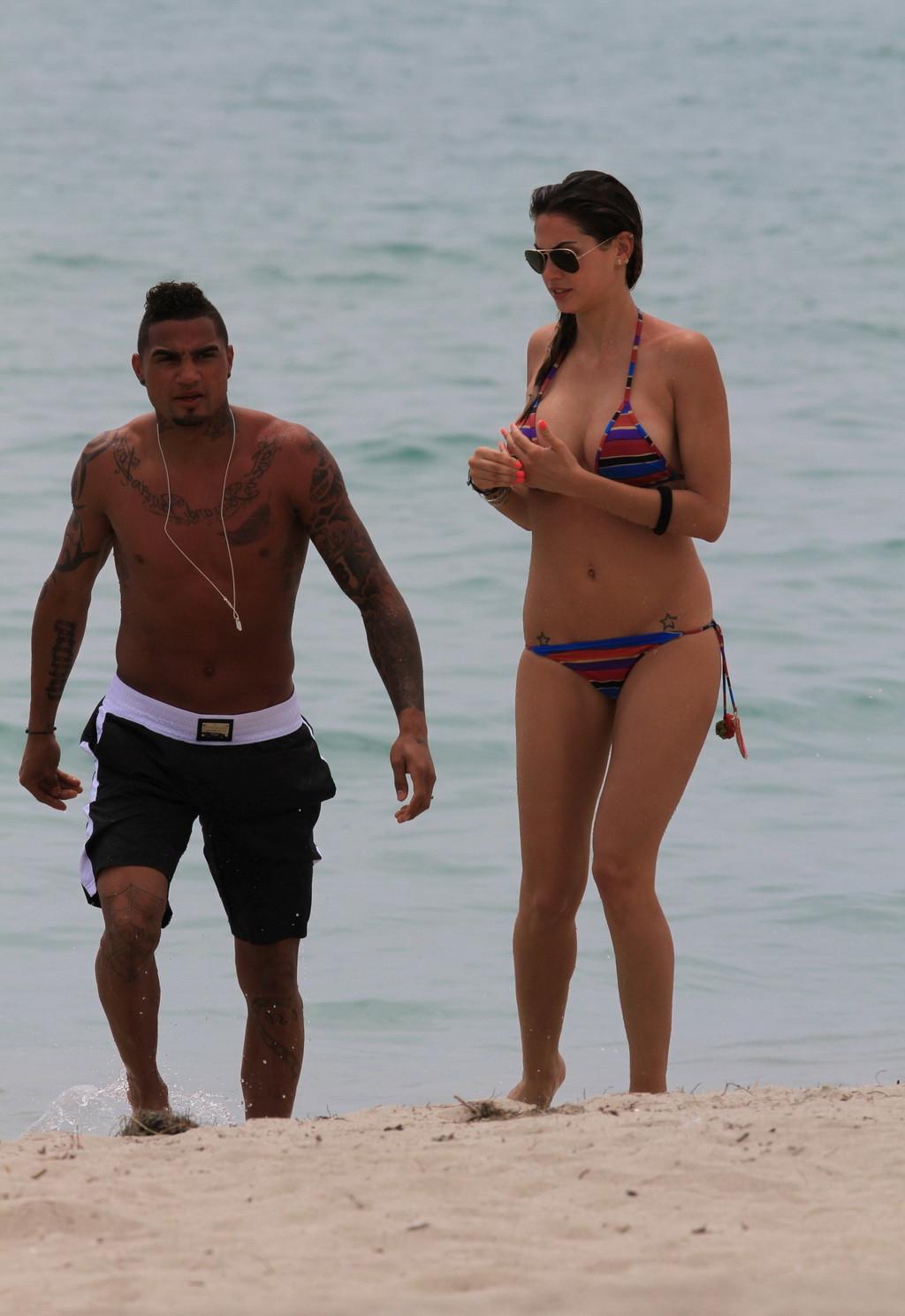 10P Busty babe Melissa Satta showing off her big boobs and juicy ass in skimpy multi