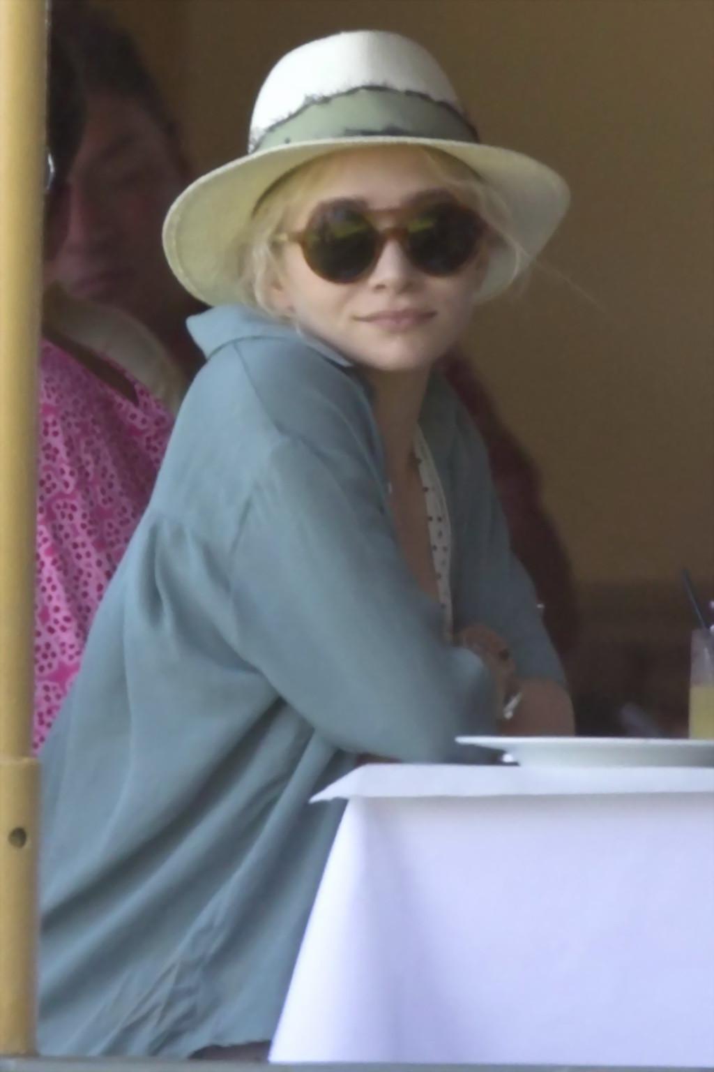 9P Ashley Olsen showing off her small tits and juicy ass in wet bikini at the beach