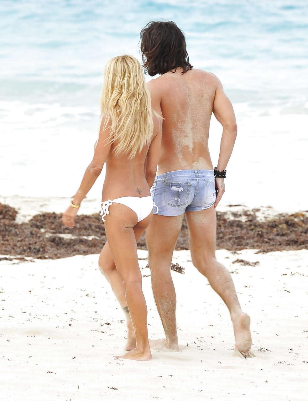 10P Shauna Sand giving blowjob and fucking on rocks on beach paparazzi pictures