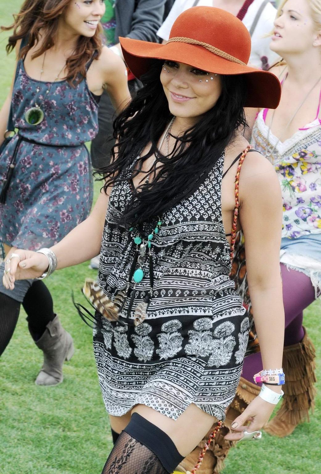 10P Vanessa Hudgens upskirt wearing a mini skirt  stockings at Coachella Music Festi