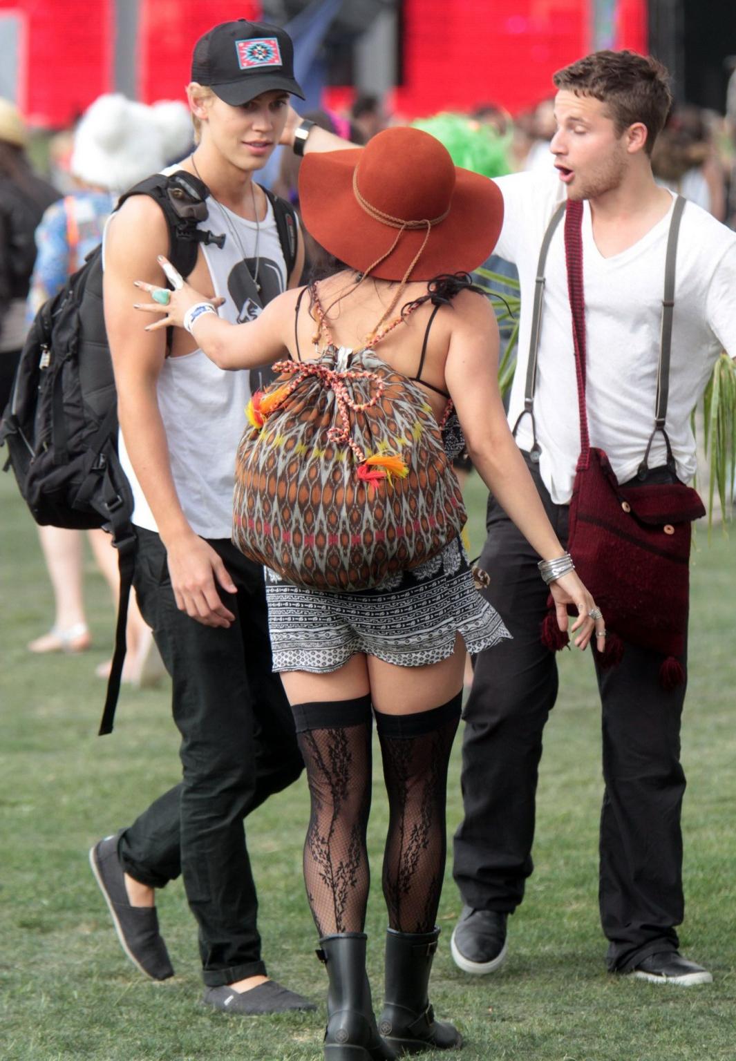 10P Vanessa Hudgens upskirt wearing a mini skirt  stockings at Coachella Music Festi