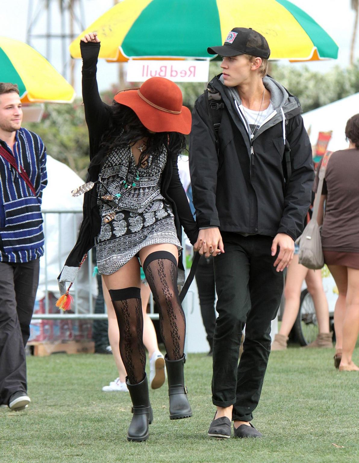 10P Vanessa Hudgens upskirt wearing a mini skirt  stockings at Coachella Music Festi