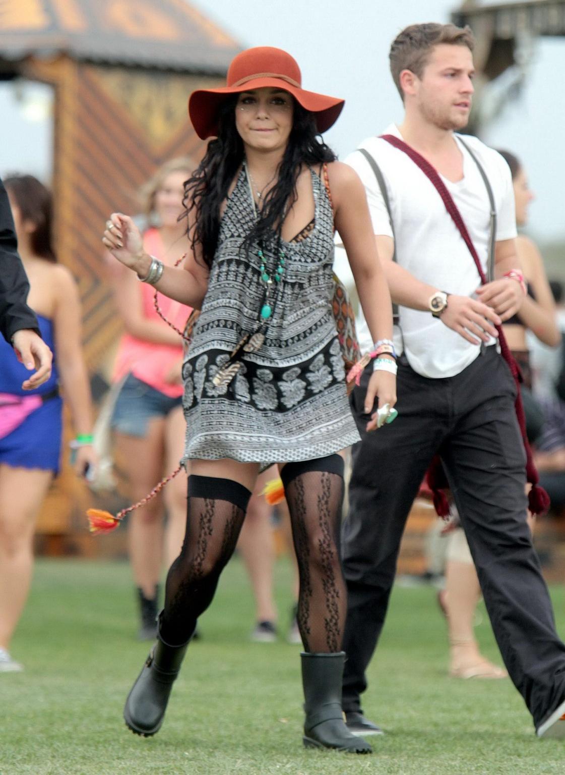 10P Vanessa Hudgens upskirt wearing a mini skirt  stockings at Coachella Music Festi