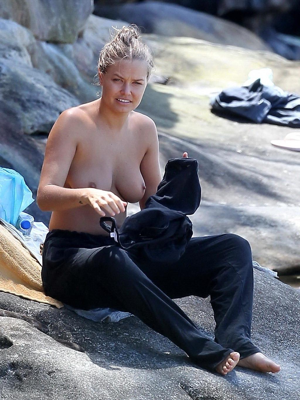 16P Lara Bingle topless showing off her big boobs on a beach in Sydney