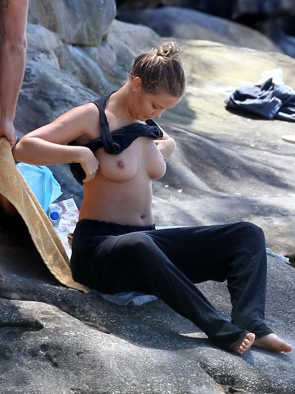 16P Lara Bingle topless showing off her big boobs on a beach in Sydney