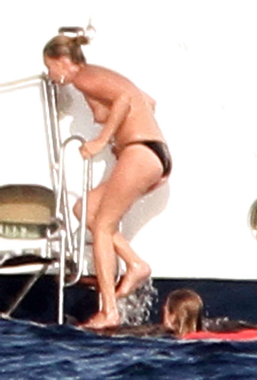 16P Kate Moss topless jumping from yach and showing her panties paparazzi shoots