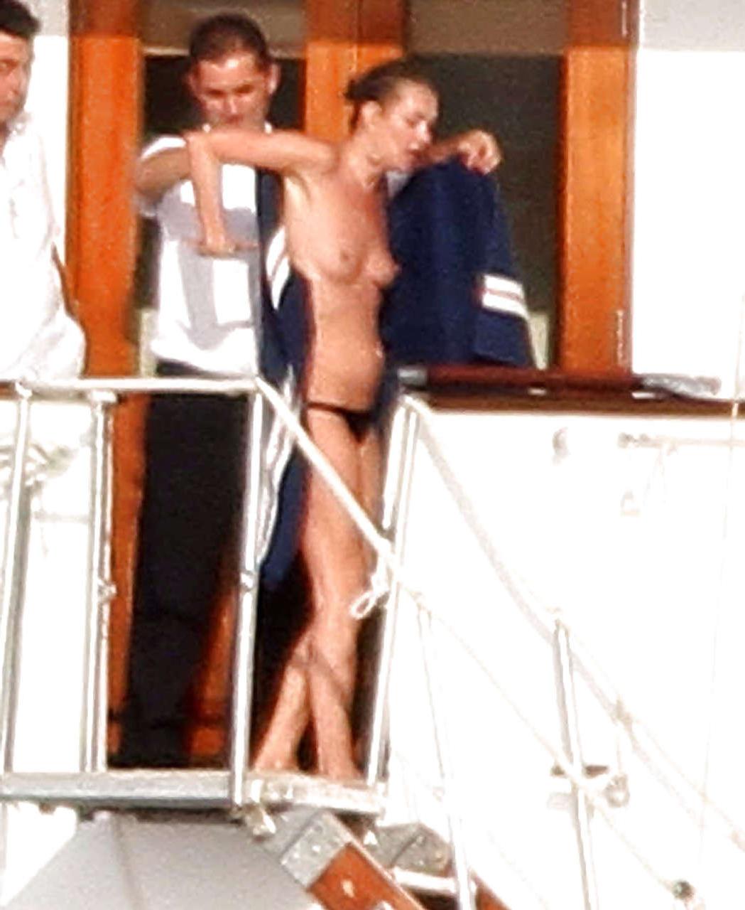 16P Kate Moss topless jumping from yach and showing her panties paparazzi shoots