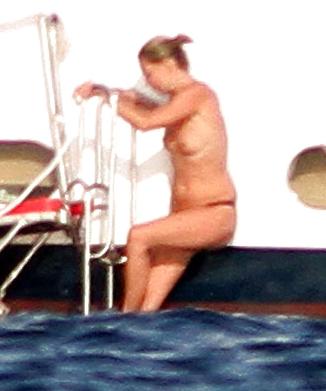 16P Kate Moss topless jumping from yach and showing her panties paparazzi shoots