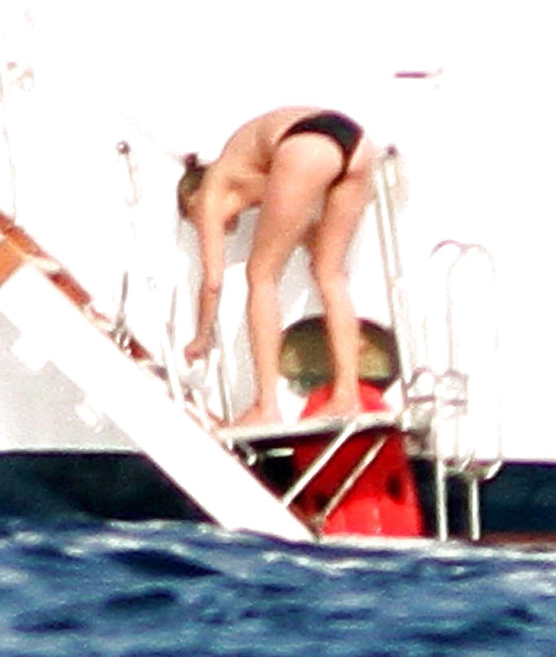16P Kate Moss topless jumping from yach and showing her panties paparazzi shoots