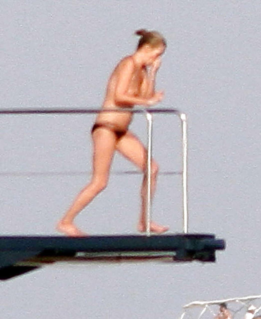 16P Kate Moss topless jumping from yach and showing her panties paparazzi shoots
