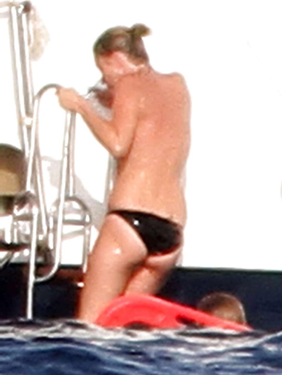 16P Kate Moss topless jumping from yach and showing her panties paparazzi shoots