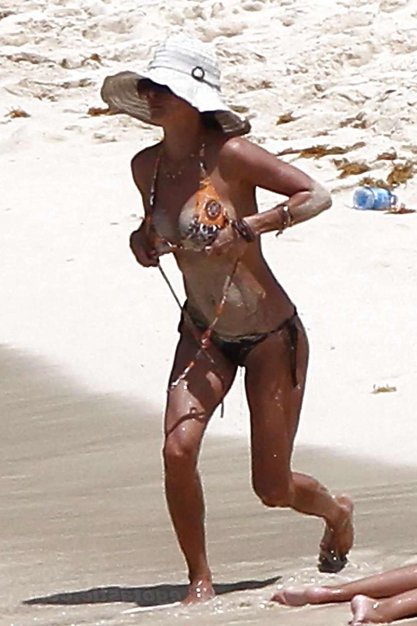 16P Brooke Burke showing her great body in various bikini and almost topless