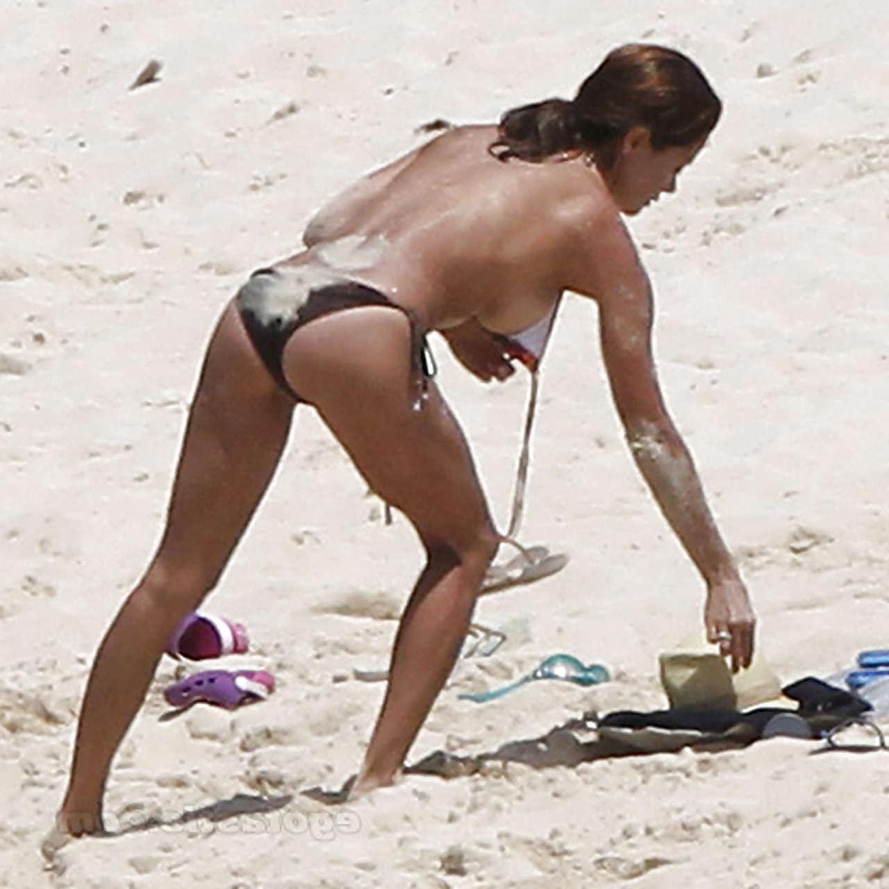 16P Brooke Burke showing her great body in various bikini and almost topless