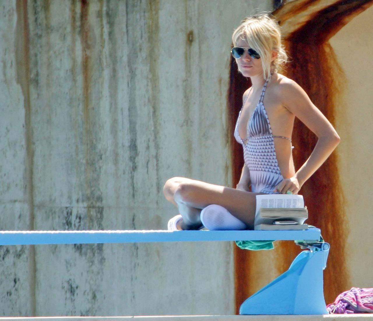 16P Sienna Miller exposing her nice boobs topless on beach paparazzi pictures