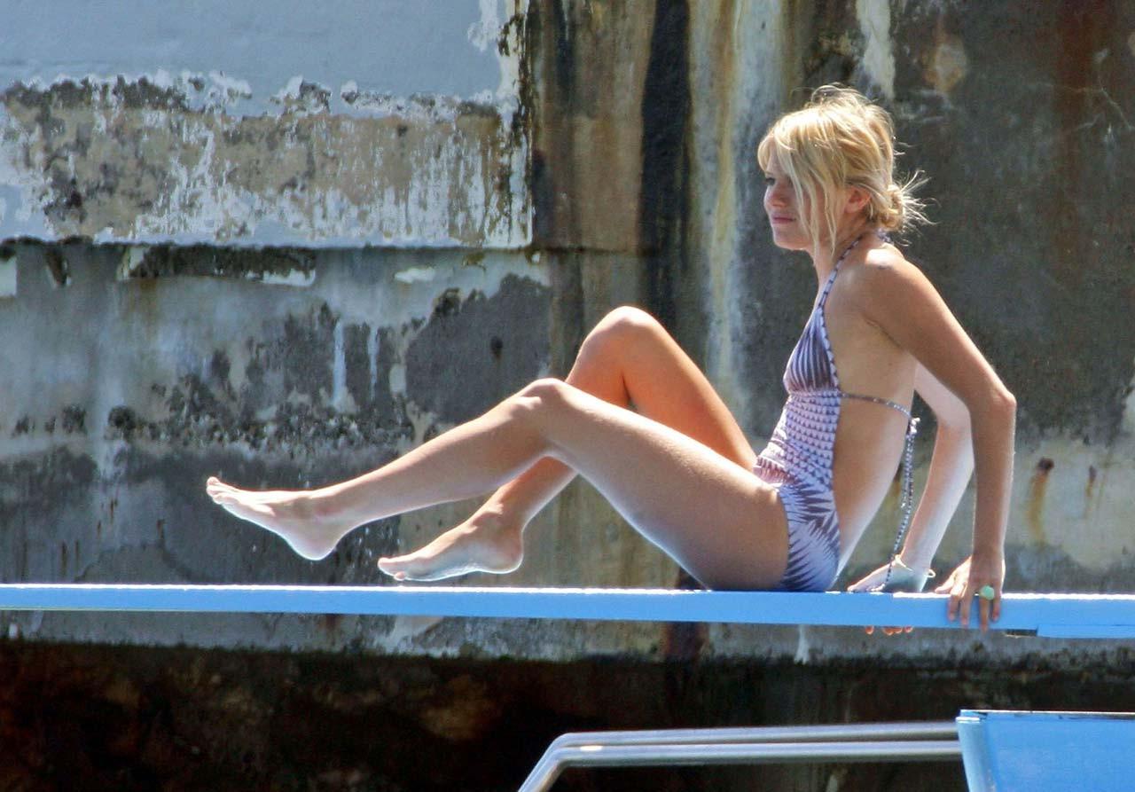 16P Sienna Miller exposing her nice boobs topless on beach paparazzi pictures