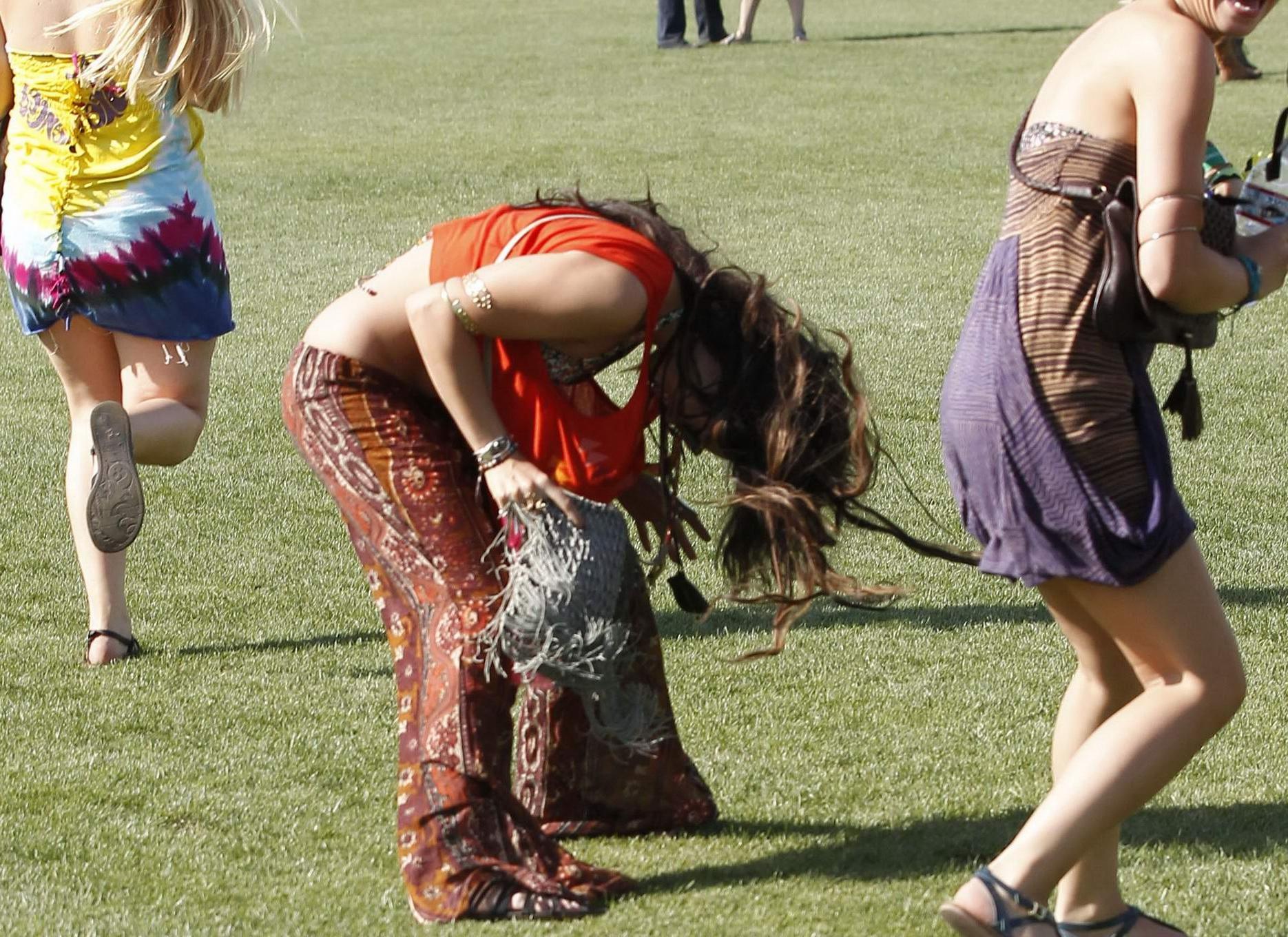 16P Vanessa Hudgens wearing bikini top at the Coachella Valley Music  Arts Festival