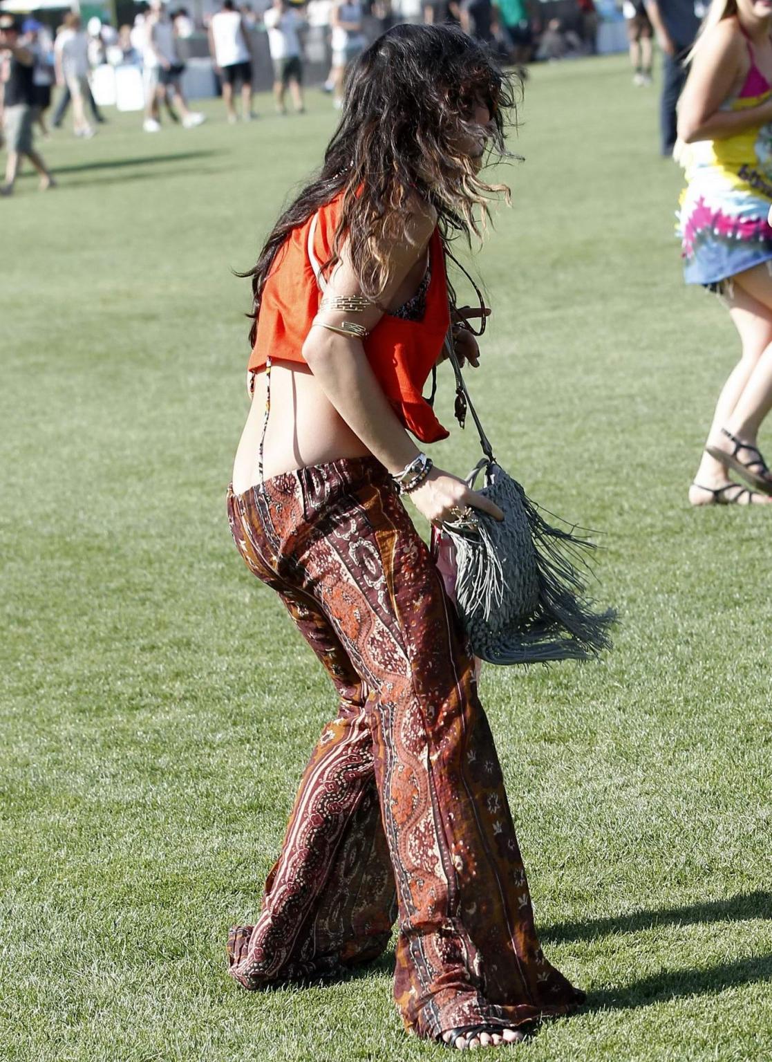 16P Vanessa Hudgens wearing bikini top at the Coachella Valley Music  Arts Festival