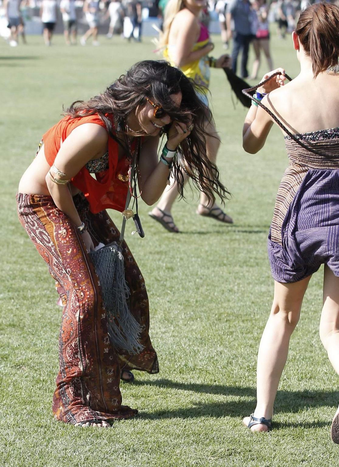 16P Vanessa Hudgens wearing bikini top at the Coachella Valley Music  Arts Festival