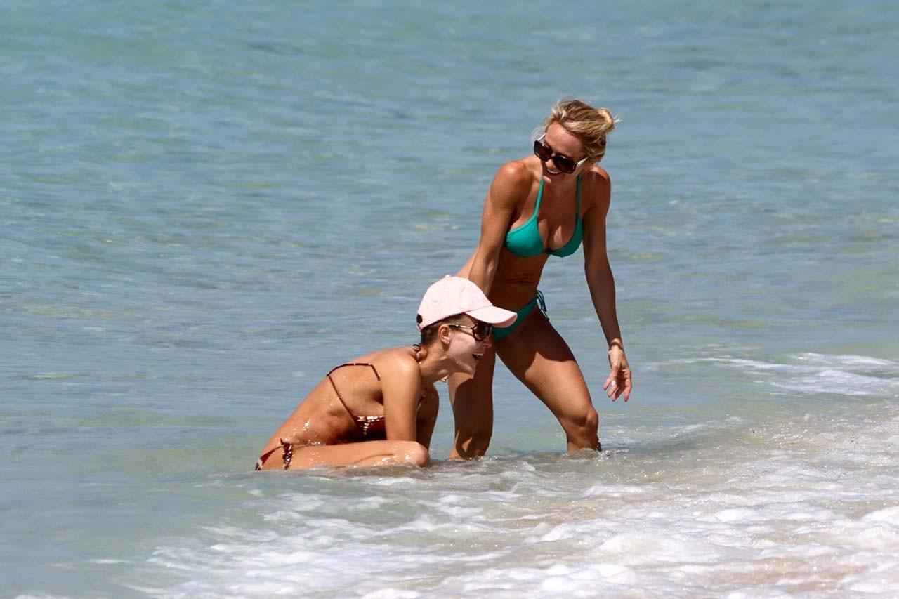 16P Joanna Krupa topless and looking very sexy in bikini on beach paparazzi pictures