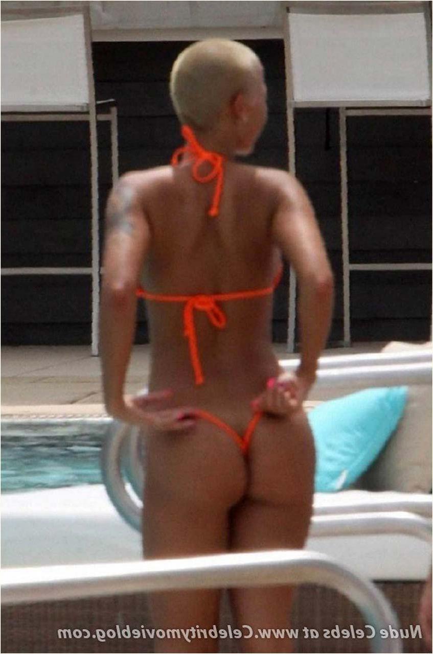 16P Amber Rose enjoying on beach in topless and exposing huge boobs