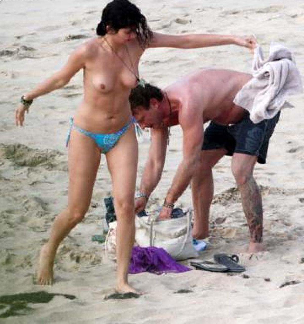 10P Shermine Shahrivar exposing her nice big tits topless on beach paparazzi picture